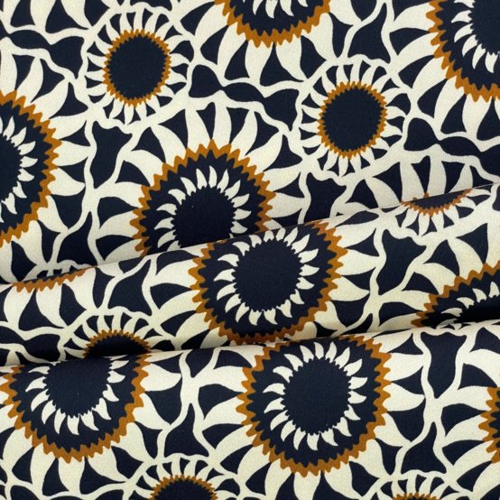 Tissu enduit  au mètre attrape soleil