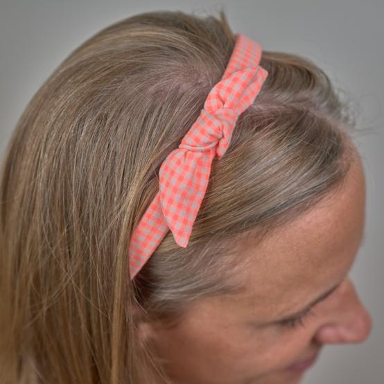Serre-tête noeud vichy orange fluo