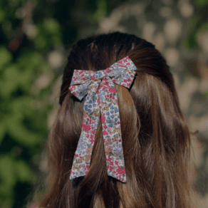 Barrette noeud ruban moyenne porcelaine rosée
