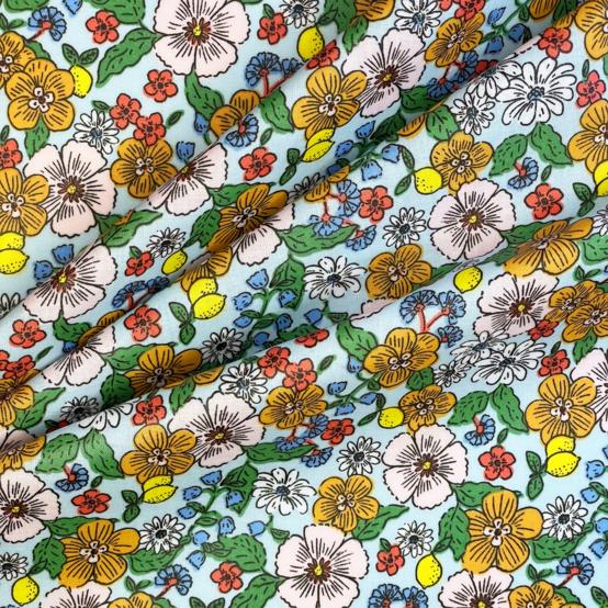 Tissu enduit  au mètre ex2525 fleurs et citrons vert jaune