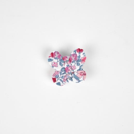 Barrette petit papillon rose grenadine