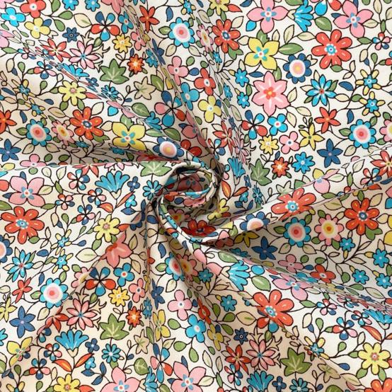 Tissu coton au mètre mille et une fleurs
