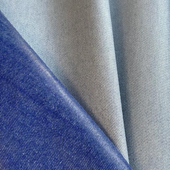 Tissu enduit au mètre jean irisé