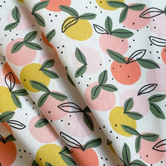 Tissu coton au mètre ex2519 ronde de fruits blanc peche