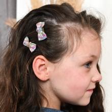 Barrettes clic-clac petits noeuds pastel fleuri