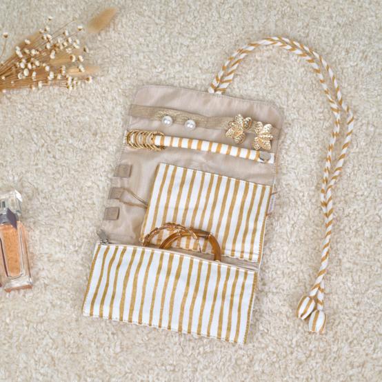 Pochette à bijoux rayé or blanc