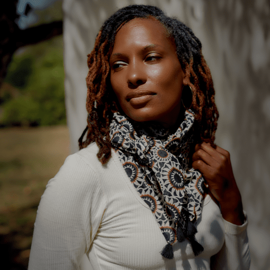 Foulard pompon attrape soleil