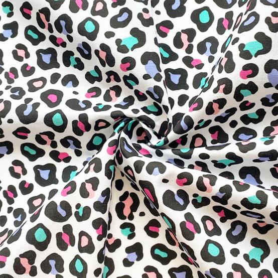 Tissu coton au mètre ex2505 léopard multicolore