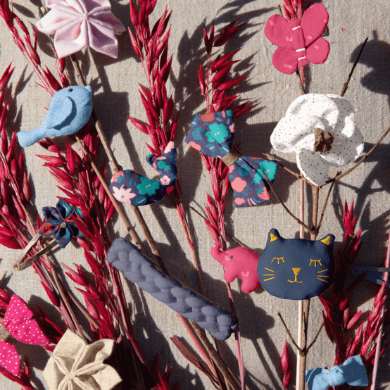 Barrette Mini Noeud Papillon fuchsia pailleté