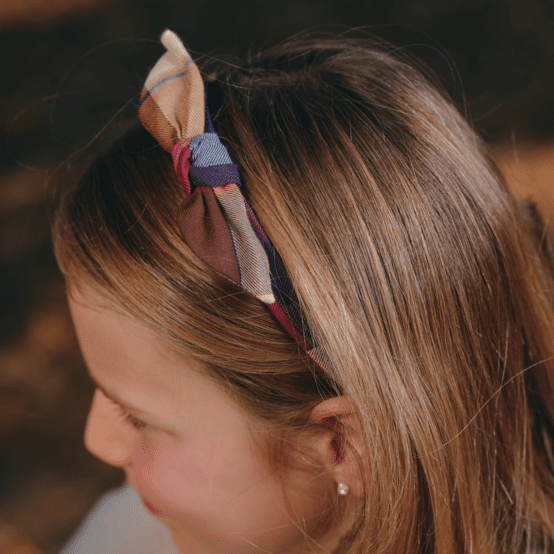 Serre-tête noeud tartan lurex rubis