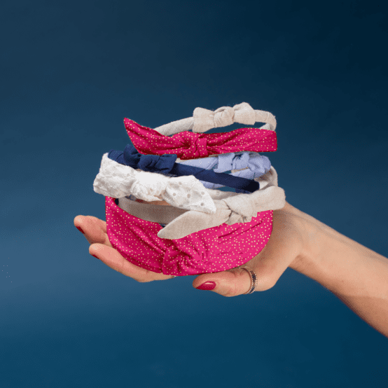 Serre-tête noeud fuchsia pailleté