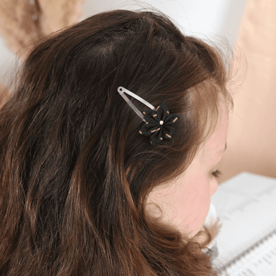 Barrette clic-clac fleur étoile  paille dorée noir