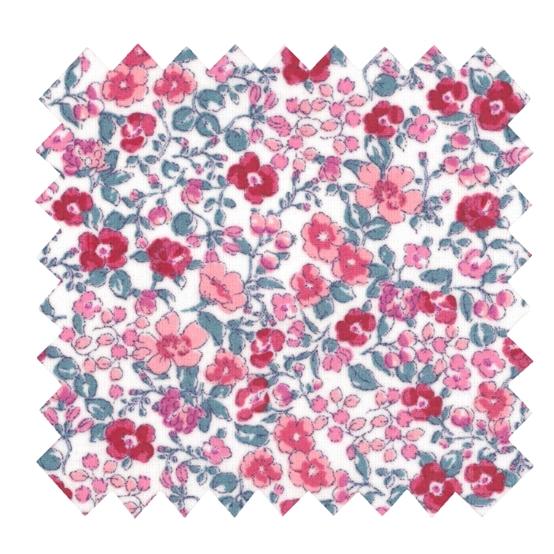 Tissu enduit  au mètre rose grenadine