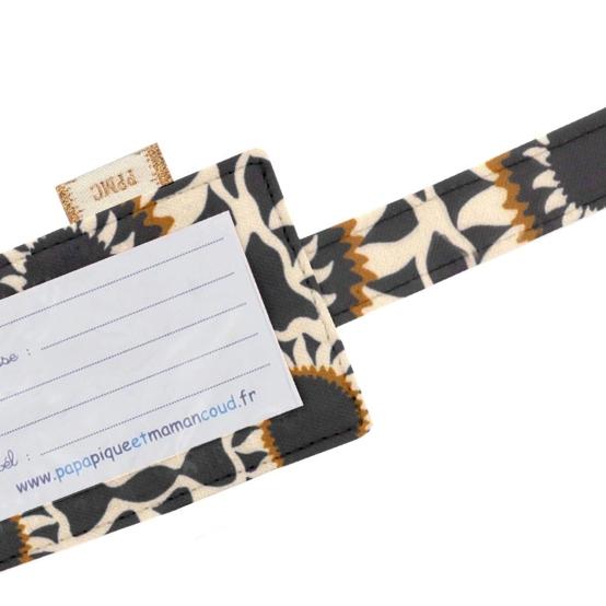 Etiquette bagage attrape soleil