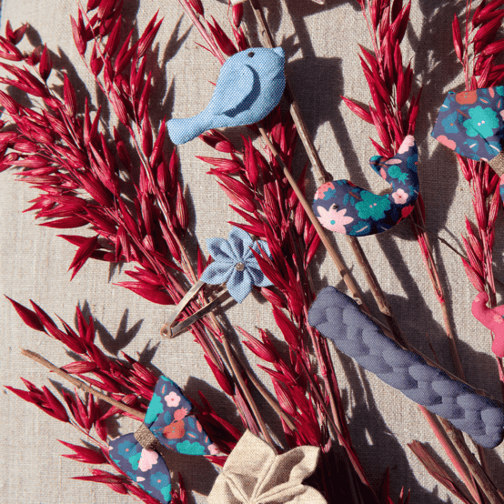 Barrette clic-clac fleur étoile oxford ciel