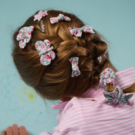 Barrettes clic-clac petits noeuds rose grenadine