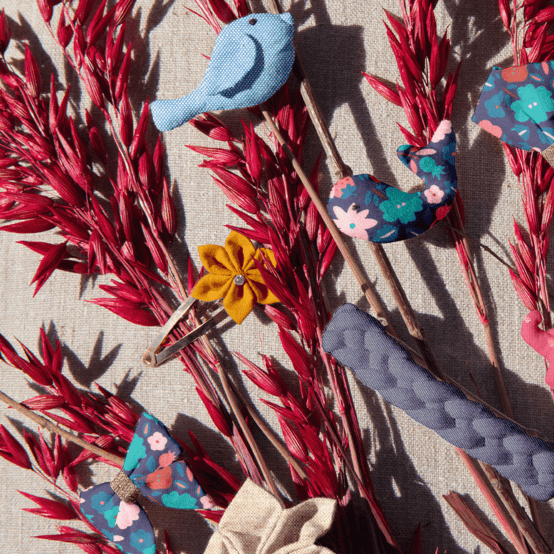 Barrette clic-clac fleur étoile ochre