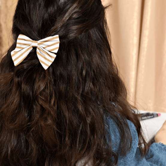 Barrette noeud papillon rayé or blanc