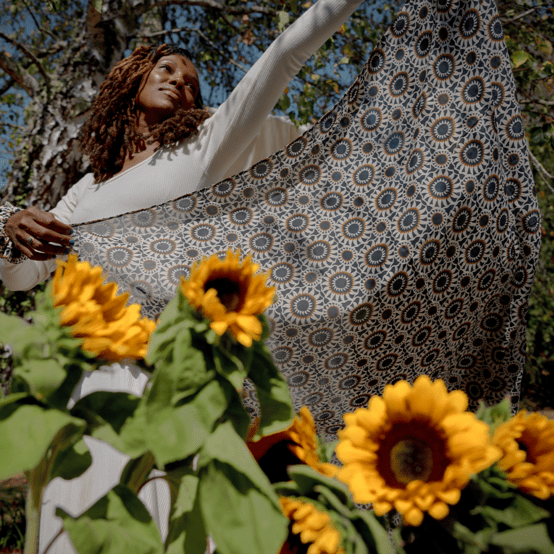 Foulard pompon attrape soleil