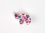 Barrette Eléphanteau rouge corolle