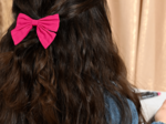 Barrette noeud papillon fuchsia