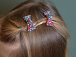 Barrettes clic-clac petits noeuds jardin d'aurore