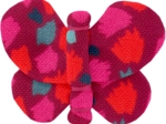 Barrette petit papillon pompons cerise