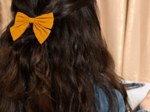Barrette noeud papillon ochre