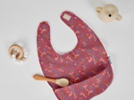 Bavoir tissu plastifié badiane framboise