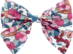 Barrette noeud papillon boutons rose