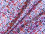 Tissu enduit au mètre ex2649 fleuri ciel rose orange