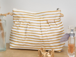 Pochette plissée rayé or blanc