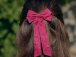 Barrette noeud ruban moyenne fuchsia pailleté
