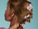 Barrette petit papillon rose grenadine