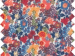 Tissu enduit  au mètre fleuri orange bleu blanc ex1064