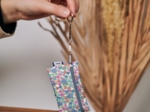 Pochette porte-clés pastel fleuri