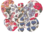 Barrette petit papillon porcelaine rosée