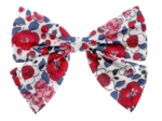Barrette noeud papillon rouge corolle