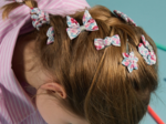 Barrette Mini Noeud Papillon rose grenadine