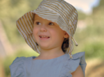 Chapeau de soleil enfant rayé or blanc