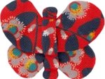 Barrette petit papillon feuillage vermillon