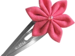 Barrette clic-clac fleur étoile rose pailleté