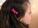 Petite barrette mini bonbon fuchsia pailleté