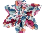 Barrette fleur étoile boutons rose