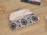 Etui à lunettes attrape soleil