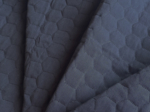 Tissu matelassé hexagonal noir