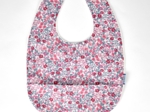 Bavoir tissu plastifié rose grenadine