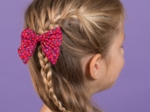 Barrette noeud papillon pompons cerise