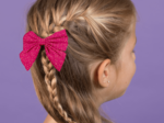 Barrette noeud papillon fuchsia pailleté