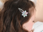 Barrette clic-clac fleur étoile pastel fleuri